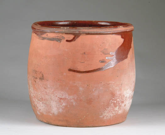 Appraisal: REDWARE JAR Interior glazed with some slip running over rim