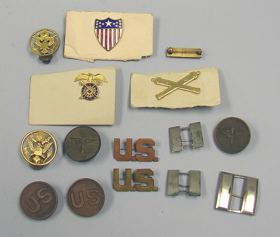 Appraisal: Lot consists of US WWI and WWII metal collar devices