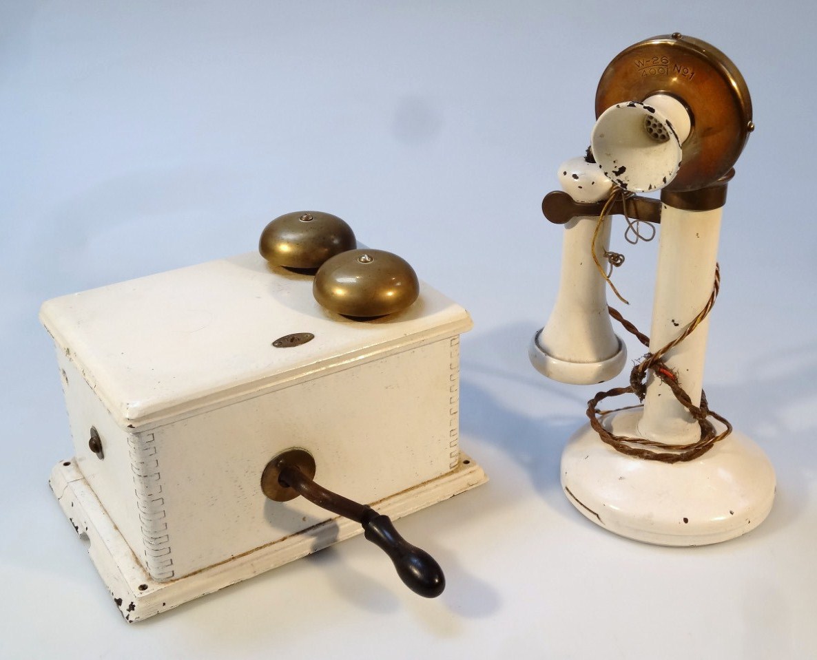 Appraisal: A thC candlestick style telephone with brass mounts and horn