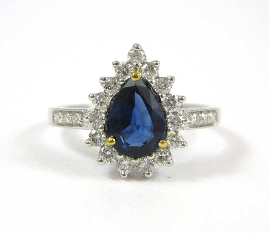 Appraisal: SAPPHIRE DIAMOND AND FOURTEEN KARAT GOLD RING The white gold