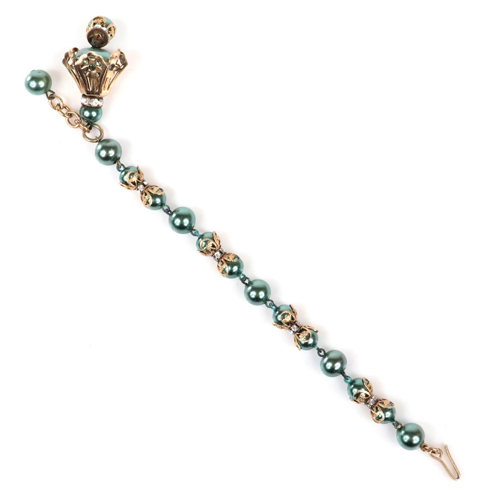 Appraisal: EISENBERG TASSEL BRACELET WITH LUMINESCENT BLUE BEADS LINKED SINGLY OR