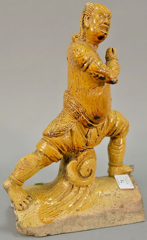 Appraisal: Chinese figural roof tile yellow glazed ht in Chinese figural