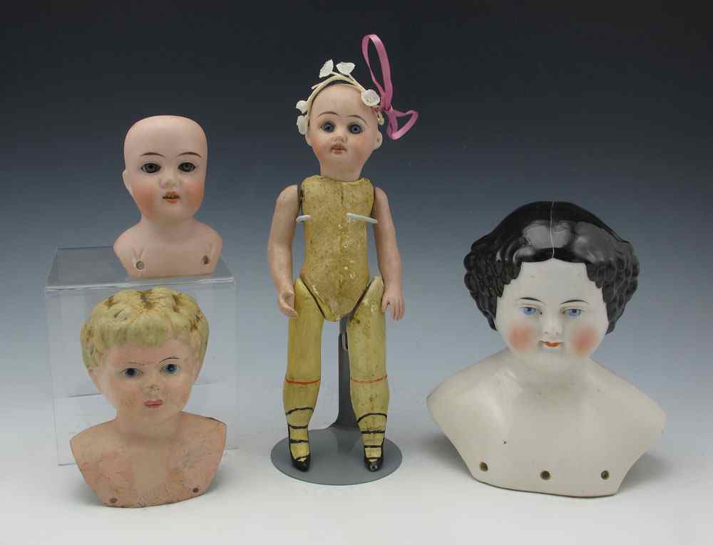 Appraisal: GERMAN BISQUE HEAD DOLL PLUS EXTRAS '' doll bisque head