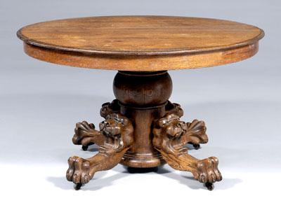 Appraisal: Oak lion carved pedestal table circular top opening to accommodate