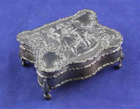 Appraisal: An Edwardian silver trinket box of serpentine form and embossed