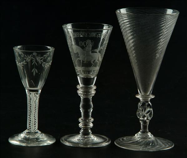 Appraisal: Three various wine glasses comprising a commemorative Williamite-style glass for