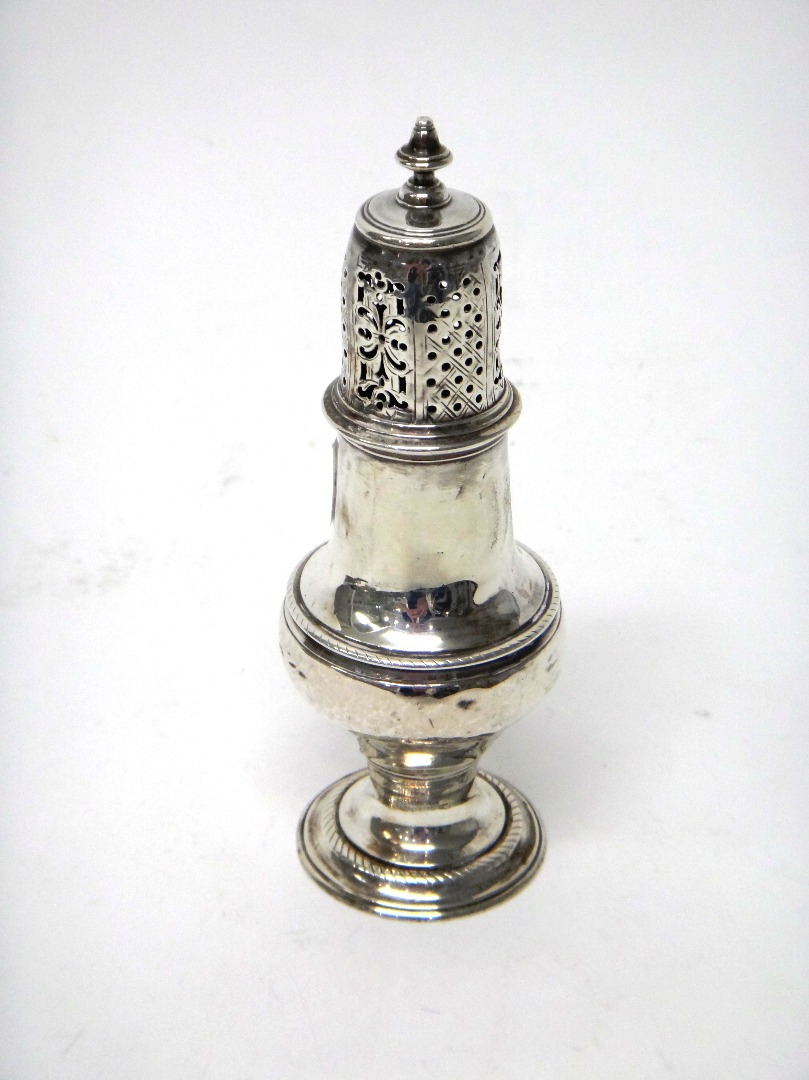 Appraisal: A George III silver sugar caster of baluster form on