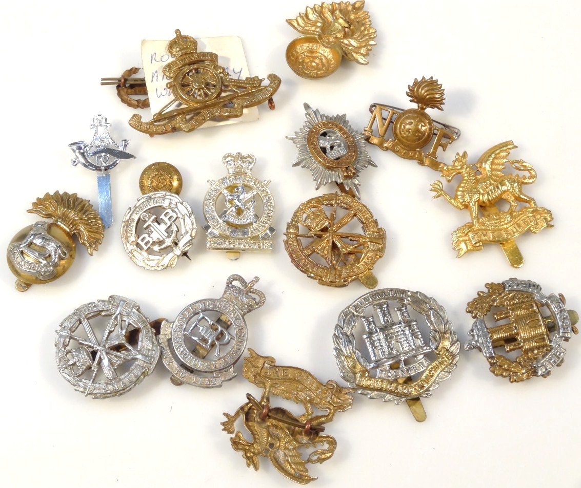 Appraisal: Various thC army cap badges to include Royal Munster cm