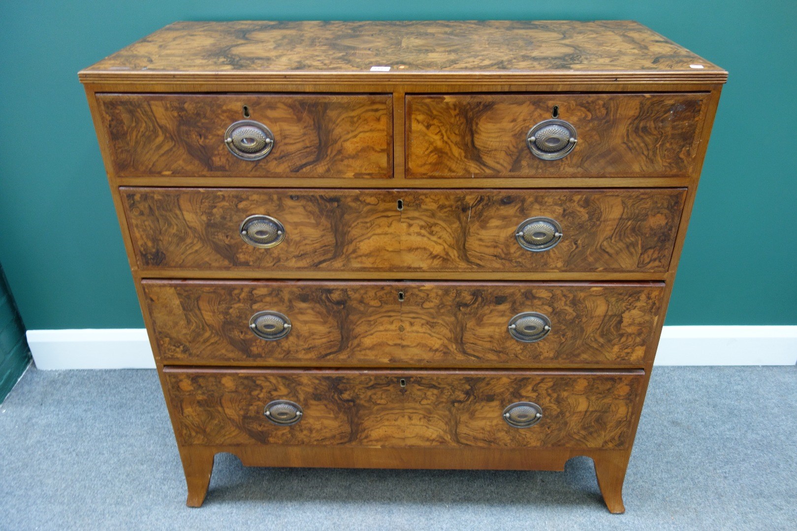 Appraisal: A George III walnut chest with two short and three