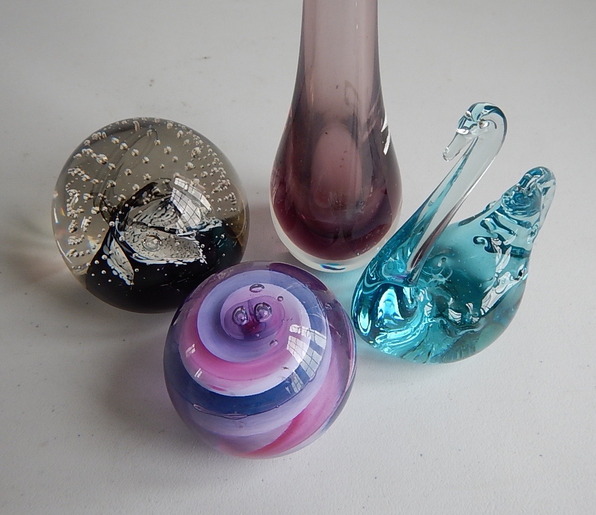 Appraisal: Two Caithness paperweights a glass swan ornament and a glass