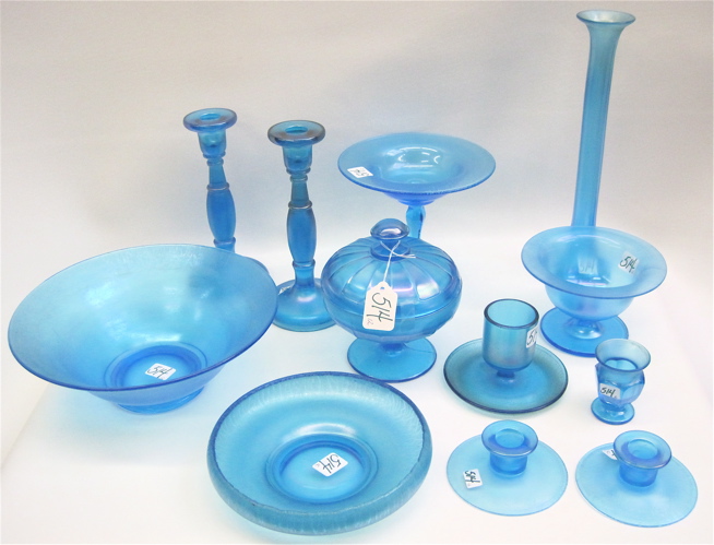 Appraisal: TWELVE PIECES BLUE STRETCH GLASS bowls and D compote D