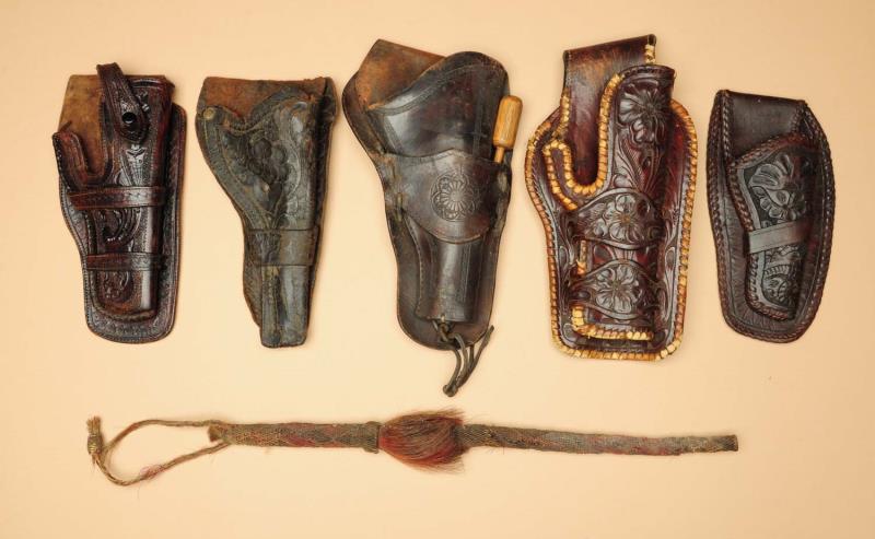 Appraisal: Lot of Leather Items This lot includes five single holsters