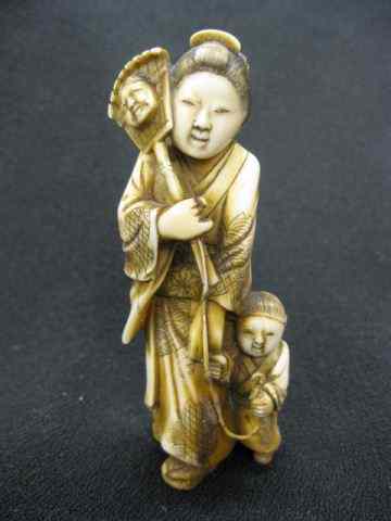 Appraisal: Chinese Carved Ivory Figurine of Mother Child with fan signed