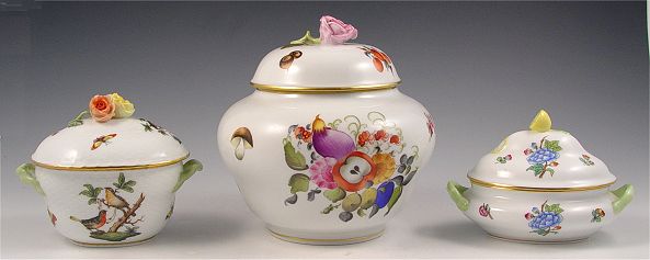 Appraisal: HEREND HANDPAINTED COVERED JARS Vegetable and fruit decorated covered jar