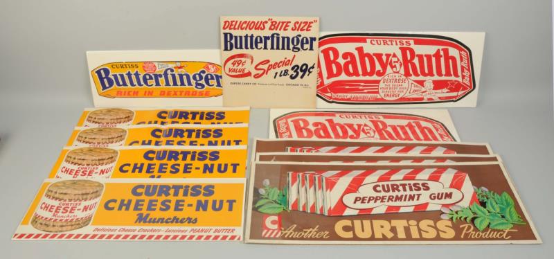 Appraisal: Lot Of Curtiss Candy Signs This lot includes assorted cardboard