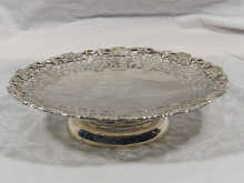 Appraisal: A silver cake stand with applied cast and pierced decoration