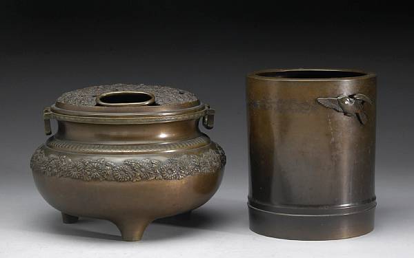 Appraisal: Two bronze hibachi Meiji period The first a tripod globular