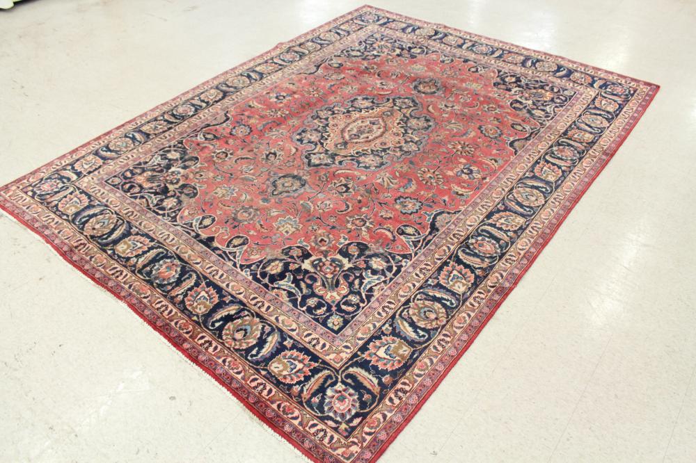 Appraisal: HAND KNOTTED PERSIAN CARPET floral and central floral medallion design