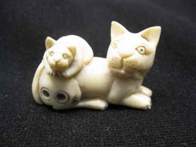 Appraisal: Carved Ivory Netsuke of Cat Kitten signed '' long excellent