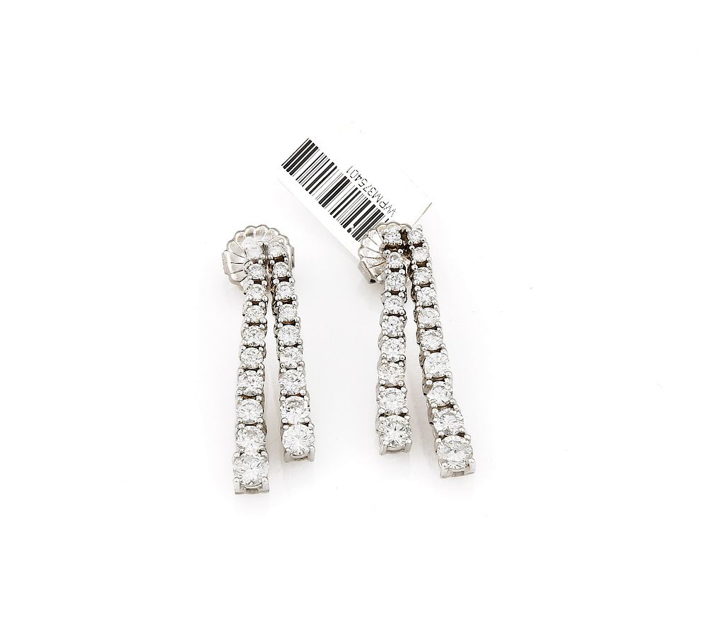 Appraisal: K White Gold Diamond Dangle Earrings k white gold featuring