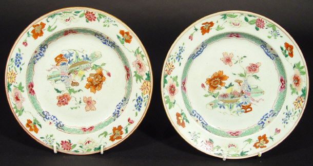 Appraisal: Pair of oriental porcelain plates each painted in the Famille