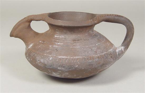 Appraisal: Middle Eastern Terra Cotta Pitcher Attached tag states origin to