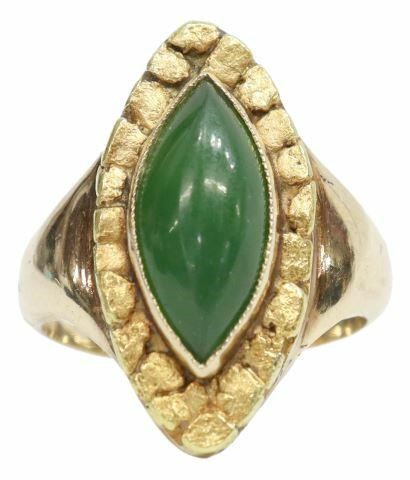 Appraisal: Estate kt yellow gold ring with marquise green stone cabochon