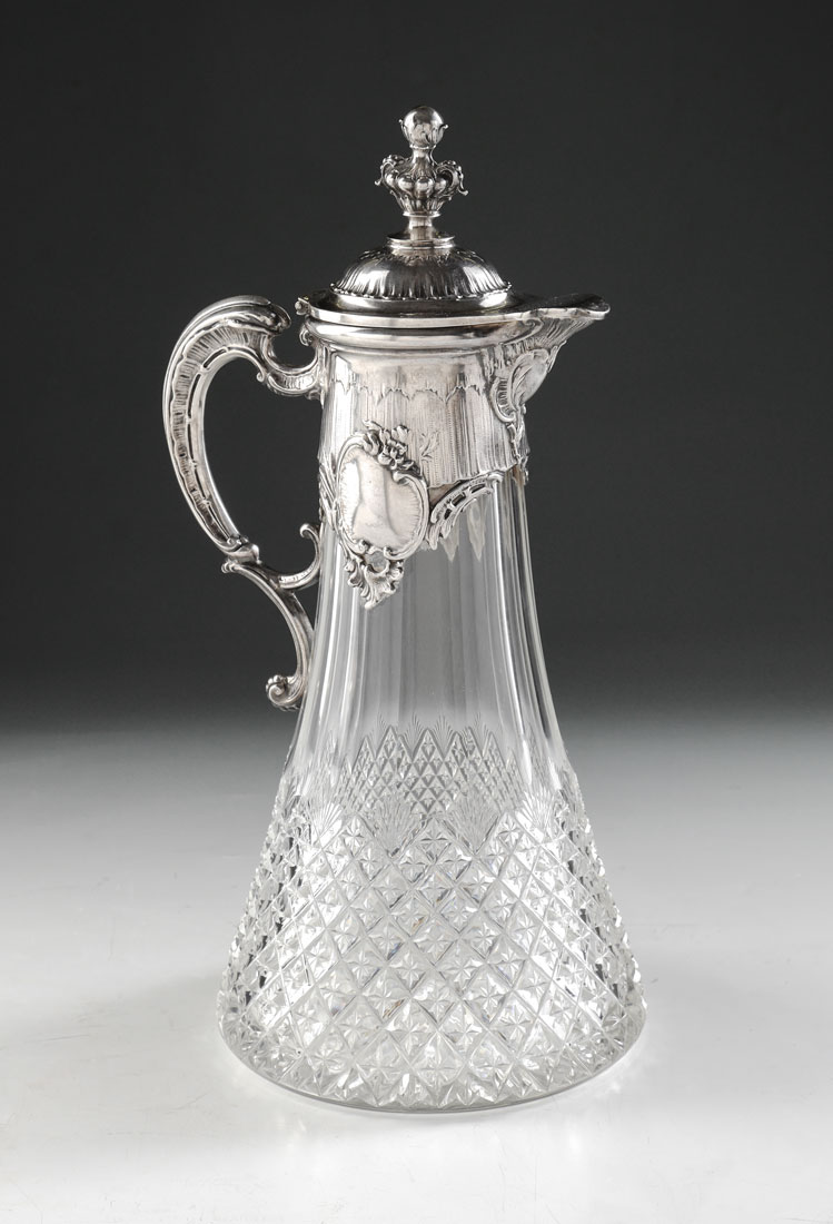 Appraisal: GERMAN SILVER MOUNTED CUT GLASS CLARET JUG Embossed German silver