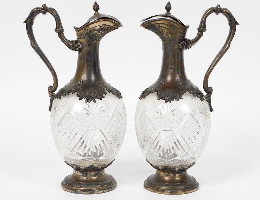 Appraisal: PAIR OF CUT GLASS AND SILVER PLATED MOUNTED DECANTERS No