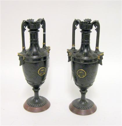 Appraisal: Pair of Neoclassical style parcel gilt patinated metal urnsEach of