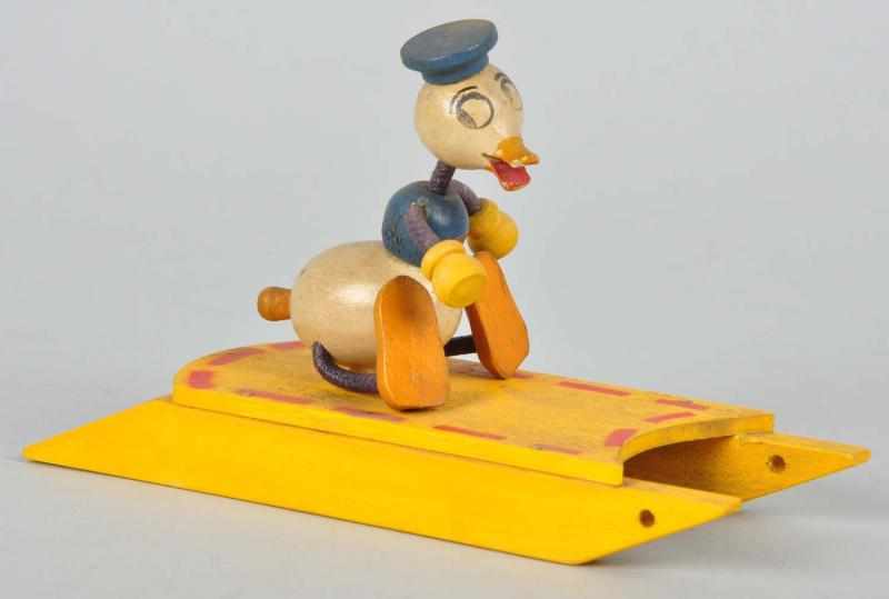 Appraisal: Disney Fun-E-Flex Donald Duck on Sled Description Pre-war Very scarce