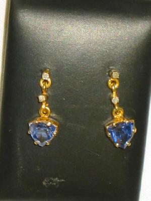 Appraisal: A PAIR OF TRIANGULAR SAPPHIRE DROP EARRINGS suspended via two