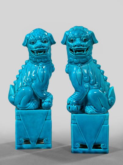 Appraisal: Pair of Chinese Turquoise-Glazed Porcelain Foo Dogs depicting a male