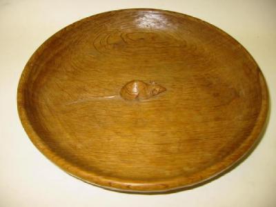 Appraisal: AN ADZED OAK FRUIT BOWL by Robert Mouseman Thompson of