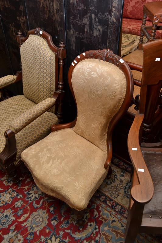 Appraisal: A VICTORIAN CEDAR GENTS AND LADIES PAIR OF UPHOLSTERED CHAIRS