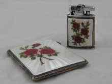 Appraisal: A silver cigarette case decorated with enamel flowers hallmarked Birmingham