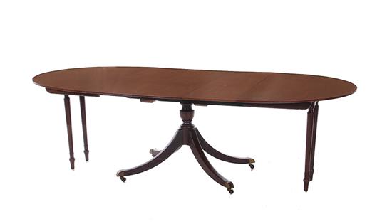 Appraisal: Baker inlaid mahogany dining table in the Sheraton taste with