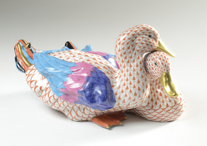 Appraisal: HEREND PORCELAIN FIGURAL PAIR OF DUCKS with rust fishnet colorful