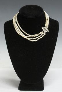 Appraisal: Four strings of irregular oval pearls white with vibrant lustre