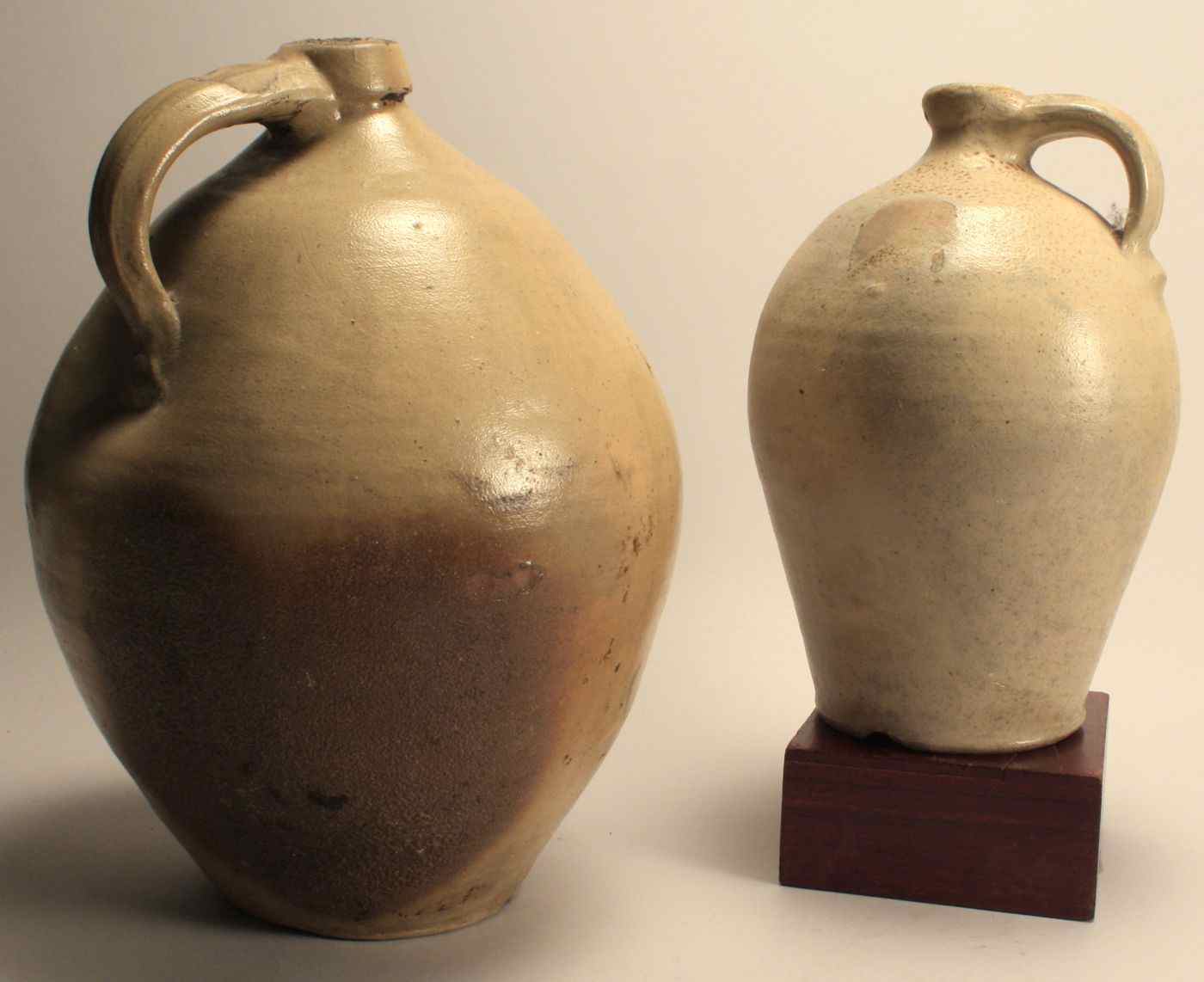 Appraisal: TWO CHARLESTOWN STONEWARE JUGS th CenturyOne with the Edwards mark