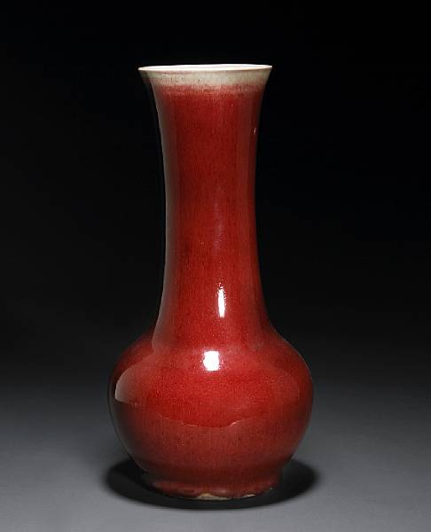 Appraisal: A transmutation red glazed porcelain vase Qing Dynasty Its tall