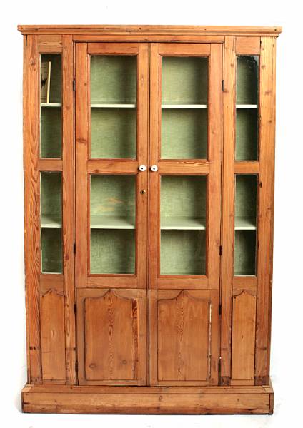 Appraisal: A stripped pine book case height ft in width ft