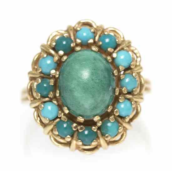 Appraisal: A Karat Yellow Gold and Turquoise Ring containing one oval