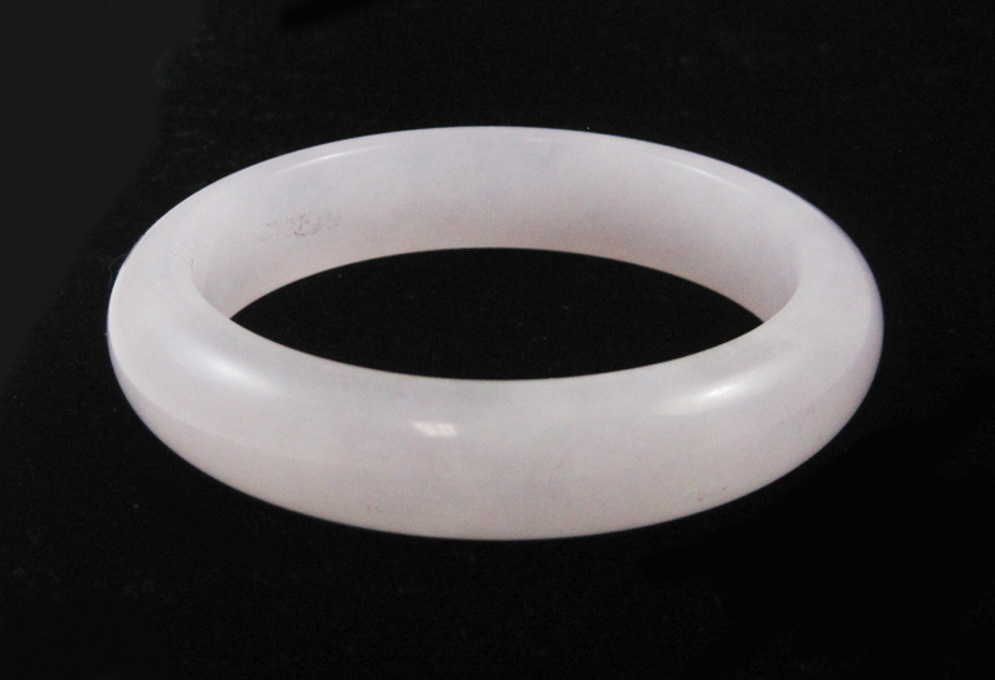 Appraisal: ROSE QUARTZ BANGLE weighing grams and measuring - inches in