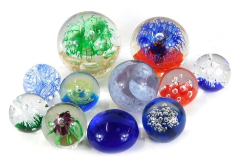 Appraisal: A group of glass paperweights comprising two marked Caithness bubble