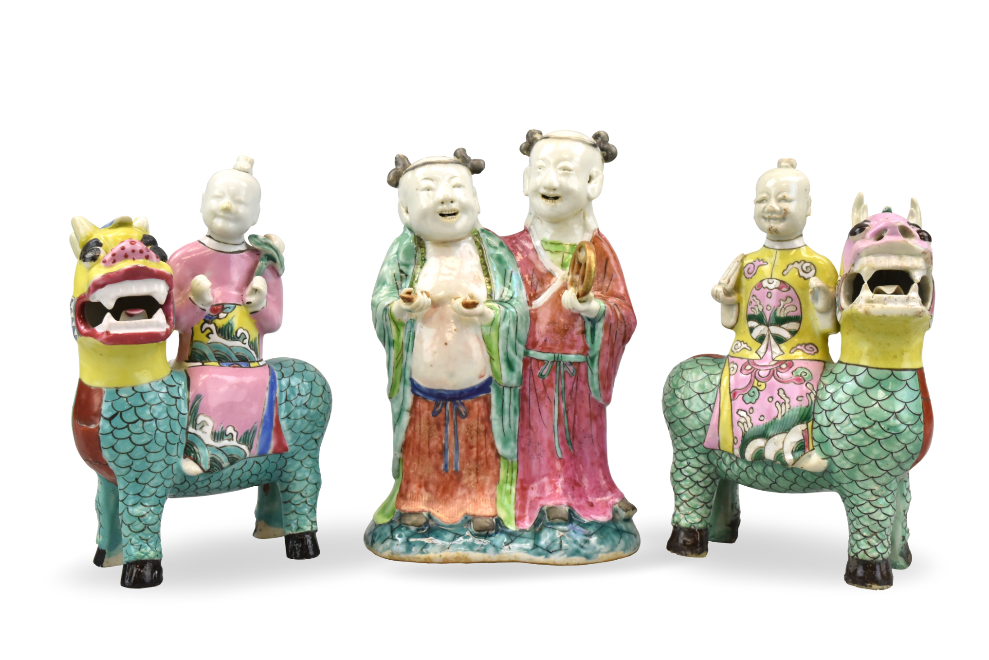 Appraisal: Three Chinese famille rose figures two smiling figures riding a