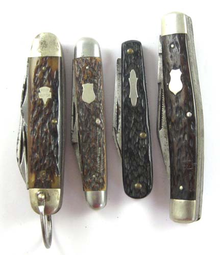 Appraisal: FOUR COLLECTABLE BONE STAG HANDLE POCKET KNIVES Remington Stockman No