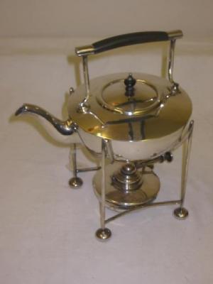 Appraisal: A WALKER HALL SPIRIT KETTLE of circular form with squared