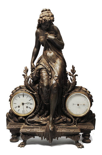 Appraisal: A TH CENTURY SPELTER MANTEL CLOCK AND BAROMETER with central