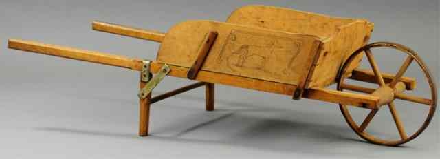 Appraisal: CHILD'S WHEELBARROW Made of wood open wheelbarrow with wooden spoke